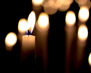 burning candles  in the dark