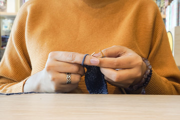 Women's hands knitting