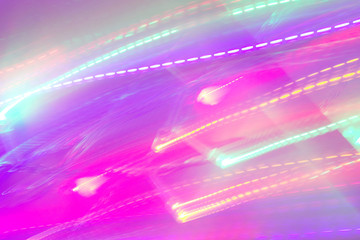 Chaotic lights in moriol blur out of focus - abstract photograph background.