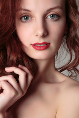 Portrait of beautiful redhead girl close up