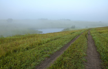 Fototapeta na wymiar Misty summer landscape