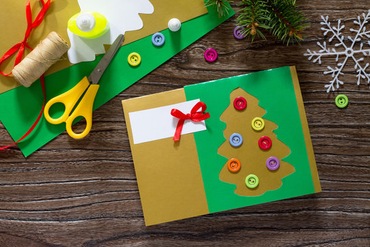 The child create Christmas greeting cards paper festive fir in C