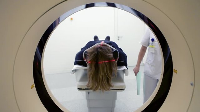 Patient female on magnetic resonance imaging for a medical examination
