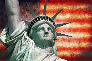 Statue of Liberty with USA flag in the background
