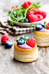 puff  pastry stuffed with soft blueberry curd with berries and t