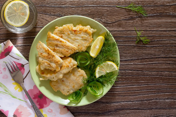 Fried fish with potato batter - healthy eating, diet, top view.