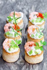 salted  puff pastry stuffed with cream cheese and prawns