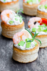salted  puff pastry stuffed with cream cheese and prawns