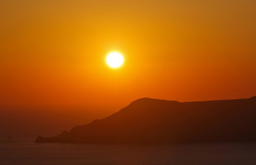 view on sunset in Fira town on Santorini