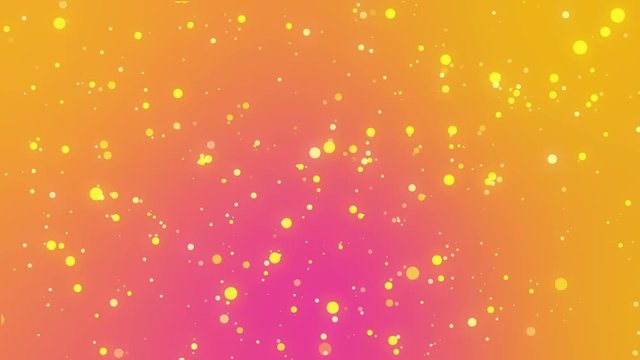 Romantic festive background with glowing golden yellow particles flickering against an orange pink gradient background.