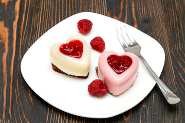 Panna cotta with raspberry jelly and fresh raspberries
