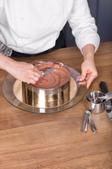 chocolate cake preparing on kitchen table