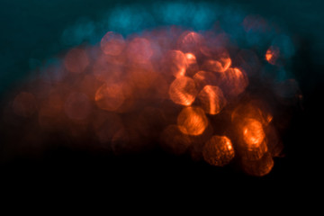 Abstract blue and orange background with bokeh