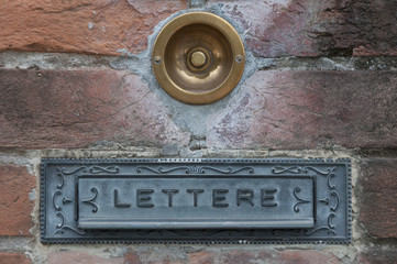 vintage mailbox and doorbell in Italy, Brescia