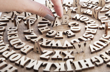 Abstract background with wooden alphabet letters