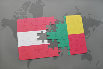 puzzle with the national flag of austria and benin on a world map background.