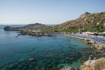 Obraz premium Ladiko beach Rhodes Island, Greece: Ladiko is a small beach located on a beautiful bay 20km south of Rhodes Town and 2km from Faliraki village.