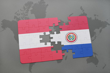 puzzle with the national flag of austria and paraguay on a world map background.