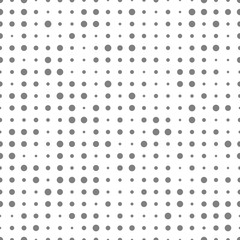 Seamless pattern with gray dots on a white background.