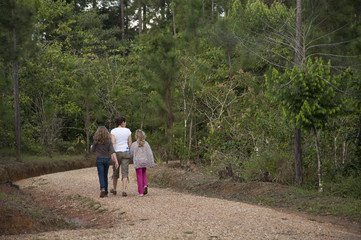 People walking along pathway in Mountain Pine Ridge Reserve in Belize