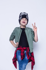 Fashionable little bad boy. Studio portrait isolated over white background
