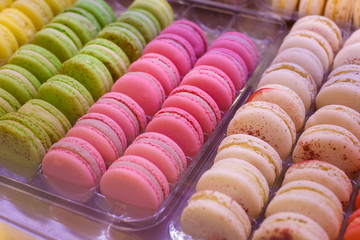 Showcases with colorful makarons
