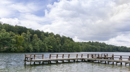 Lake Scene & Dock On A Summer Day