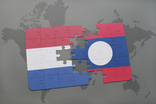 puzzle with the national flag of netherlands and laos on a world map background.