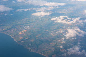 Fototapeta na wymiar land and sea seen from airplane