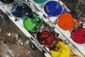 photo of water splash and color paints