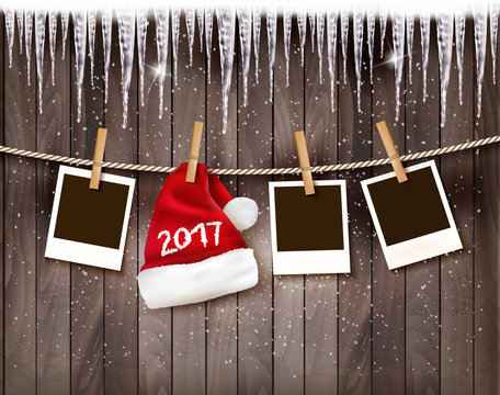 Christmas background with photos and a santa hat with 2017. Vect