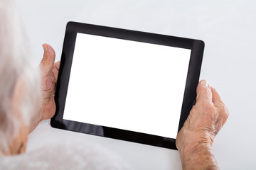 Senior Woman Holding Digital Tablet