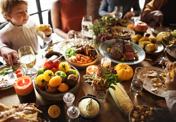 People Celebrating Thanksgiving Holiday Tradition Concept