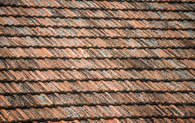 Texture of old weathered red roof tiles. 