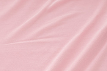 Creased pink cloth material fragment as a background - 123600290