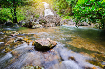 Fototapeta premium Deep forest waterfall at Sarika Waterfall World Heritage collect