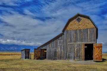 Obraz premium This is the Reed Moulton Barn located in the Mormon Row Historic District in Grand Teton National Park.