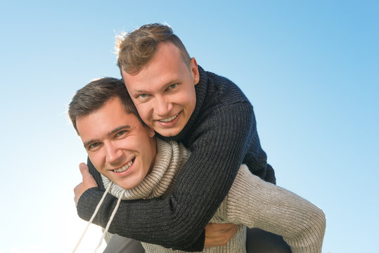 Happy young gay couple