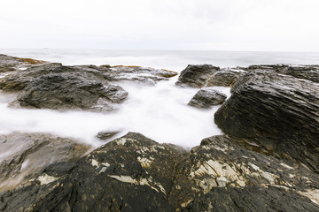 Fototapeta na wymiar View of the rocky ocean shore