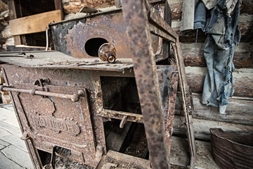 Broken Bottle on an antique stove