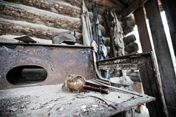 Broken Bottle on an antique stove