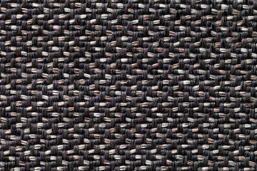 Black and white vintage fabric with woven texture closeup. Textile macro background