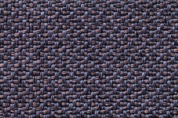 Blue and brown vintage fabric with woven texture closeup. Textile macro background