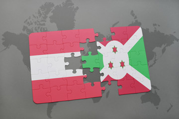 puzzle with the national flag of austria and burundi on a world map background.