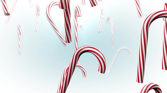 Christmas candy canes falling. Rain of peppermint sticks. Xmas decoration.
