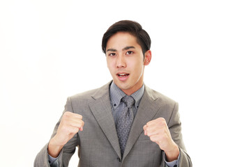 ガッツポーズのビジネスマン