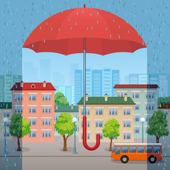 огромный красный зонтик защищает город от дождя