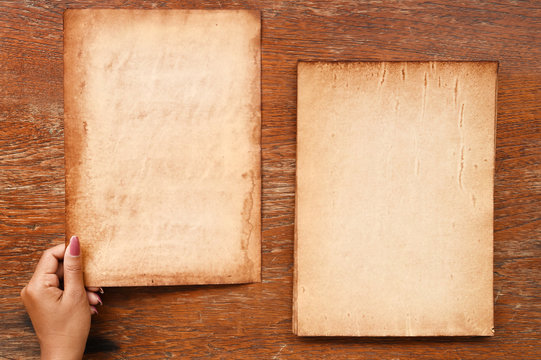 old papers texture on wooden background