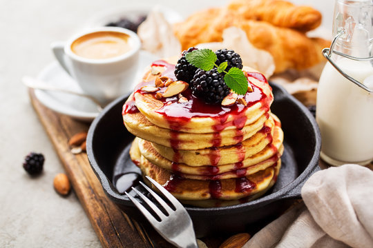 Pile of pancakes with fresh berries