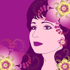 Beautiful woman's face with flowers on a purple background
